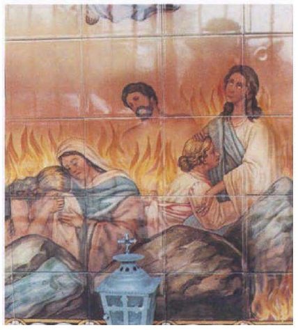 Portugal mit Bibelwahn: Ein
                        modernes Kachelbild stellt eine Seele in einem
                        Fantasie-Fegefeuer dar, und ein Fantasie-Heiler
                        tr�stet