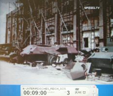 Bombed German armament industry 01:
                              the hall is damaged and under
                              reconstruction