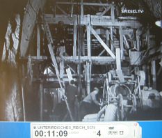 Forced laborers at Kahla 10: casing
                            works on a wooden structure