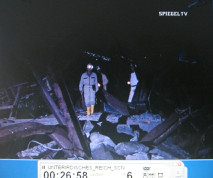 Kohnstein
                          15: marching through a tunnel with broken
                          rocket parts 01