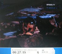 Kohnstein 17: tunnel with broken
                          parts from the rocket plant 02, a wheel on an
                          axis 01