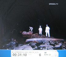 Kohnstein 38, a
                          rocket engine in a water slop in a distance