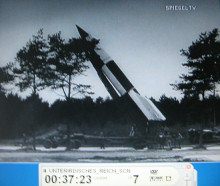 NS film: a V2 rocket is erected
                          on a carriage