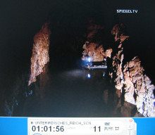 Owl Mountains 19 and 20, Juergen Mueller
                          and Jacek Duszczak cruising in the flooded
                          tunnels with an inflatable boat 02