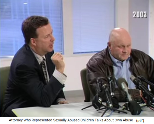 Anwalt Eric Mac Leish
                (links) als Opferanwalt an einer Pressekonferenz 2003