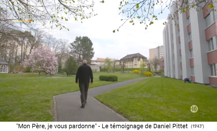 Daniel Pittet in Fribourg / Freiburg in a grass
              clearing with an art nouveau house and an apartment block