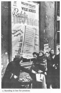 Encyclopaedia Judaica (1971): Warsaw, vol. 16, col.
                344. Standing in line for potatoes in the Warsaw ghetto.
                [[In the background can be seen a poster for a ballet
                performance]]. Photo taken in the Warsaw ghetto by a
                German war correspondent. Oct. 1, 1940-June 1, 1941.
                Courtesy Yad Vashem Archives, Jerusalem.
