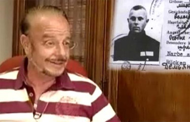 Der ehemalige Anwalt
                      von Demjanjuk, Joram Scheftel / Yoram Sheftel,
                      hier mit dem gef�lschten Demjanjuk-Ausweis im
                      Hintergrund, spricht Klartext gegen die deutsche
                      Justiz, die aus Behauptungen Beweise machen will
                      [31]