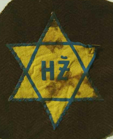 Slovakia, blue Jewish star on yellow
                          ground with inscription H� (abbreviation for
                          Slov. "Jew")