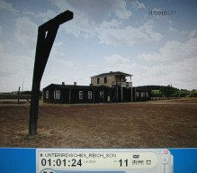 KZ Grossrosen 04, Zaun 03 mit
                        Haupthaus von vorn