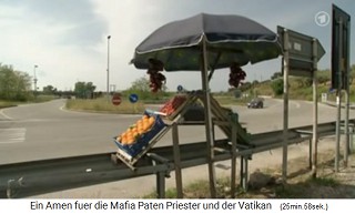 Poverty in Calabria, fruit stand
                      at a crossroads