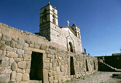 Church on Inca walls for example in
                              Vilcashuam�n in Peru 01